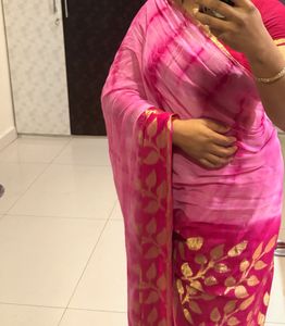 Elegant Pink Saree with Golden Motifs