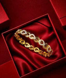 Exquisite Gold & Silver Tone Bracelet