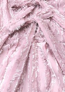 Chic Pink Peplum Top with Bow Detail