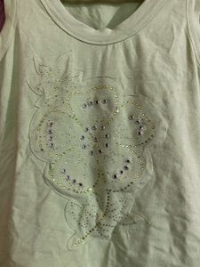 Light Green Sleeveless Top with Flower Detail