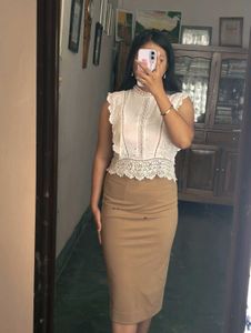 Elegant pencil brown skirt with back slit