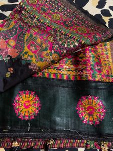 Elegant Black Saree with Intricate Peacock Motifs
