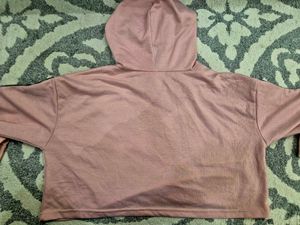 Trendy Pink Cropped Hoodie with Checkerboard Sleev