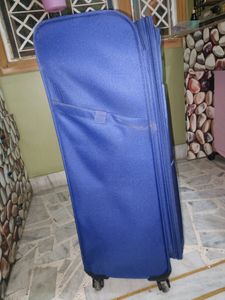 American Tourister Blue Suitcase