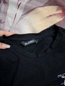 Black "Just a Girl" Cropped Tee with Ruffle Hem
