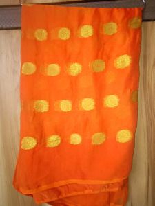 Vibrant Orange Saree with Gold Dots
