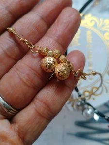 offer r Gold Chain with Black Bead