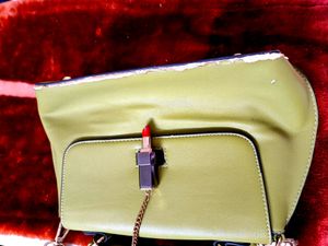 Stylish Green Hand Bag.     Lil Ripped From Its Bottom