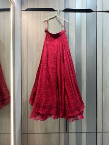 Red Lehenga with ruffle organza blouse