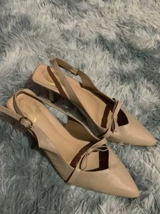 Chic Nude Slingback Heels with Bow Detail