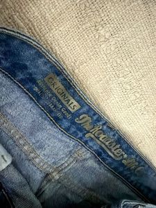 Distressed Mesh Panel Jeans