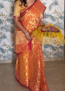 Elegant Orange Saree with Gold Motifs