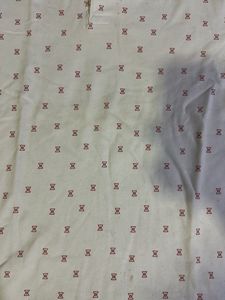 White Polo Shirt with Red Pattern