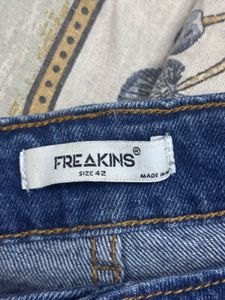 Distressed Blue Denim Jeans