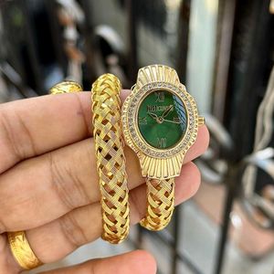 Elegant Gold Watch with Green Dial