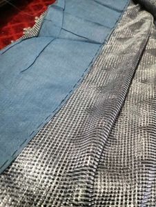 Elegant Silver Saree with Intricate Embellishments