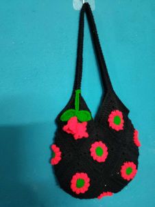 Crocheted Black Handbag with Floral Design