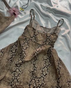 Animal Print Sleeveless Flared Top