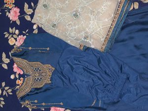 Elegant Embroidered Blue suit with net dupatta