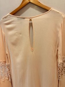 Elegant Peach Top with Lace Detail