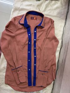 Chic Pink Button-Up Shirt with Blue Trim