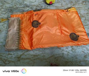 Vibrant Orange Saree with Golden Border