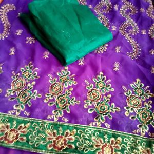 Embroidered Purple Saree with Green Blouse