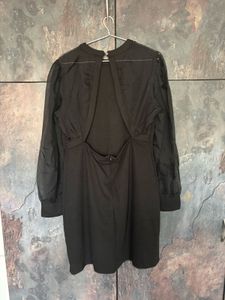 Chic Black Dress with Sheer Sleeves