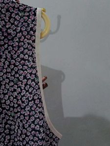 Chic Floral Sleeveless Blouse