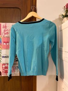 Aqua Blue Knit Top with Black Accents