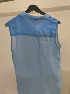 Sheer Blue Sleeveless Button-Up Top