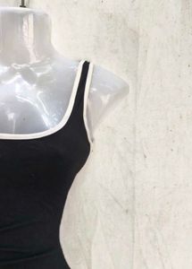 Sleek Black Bodycon Dress with White Trim