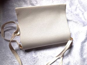 Elegant Cream Clutch Bag