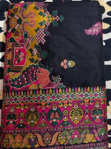 Elegant Black Saree with Intricate Peacock Motifs