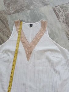 White Sleeveless V-Neck Top with Crochet Trim