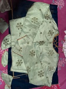 Elegant Teal Saree with Embellished Blouse