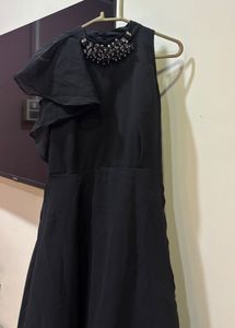 Chic Black Dress with Embellished Neckline