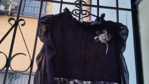 Elegant Black gown with Floral Embellishment