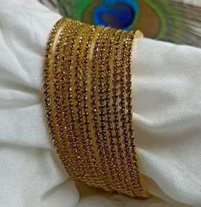 Set Of 12 Golden Bangles with Stone Detail