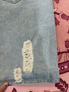 Light Wash Ripped Denim Skirt