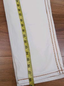 Stylish White Jeans with Brown Stitching
