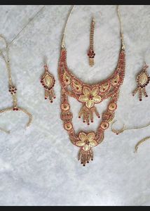 16.Stunning Red and Gold Bridal Jewellery Set