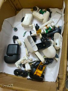 Assorted Earbud Cases and Earbuds