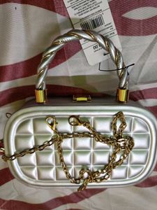 Elegant Silver Textured Clutch with Chain