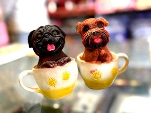 Dog in a Cup Figurine