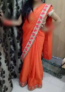 Vibrant Orange Saree with Embellished Border