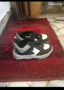7. BOYs Black and White Sneakers