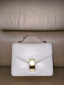 Classic White Structured Handbag with Gold Clasp