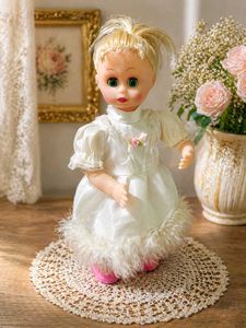Vintage Doll with White Dress