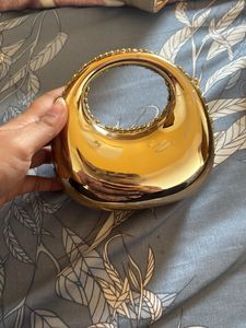 celebrity style mini golden purse